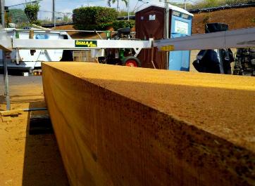 roughing out koa log for canoe