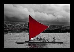 Unlimited sailing canoe out on the ocean